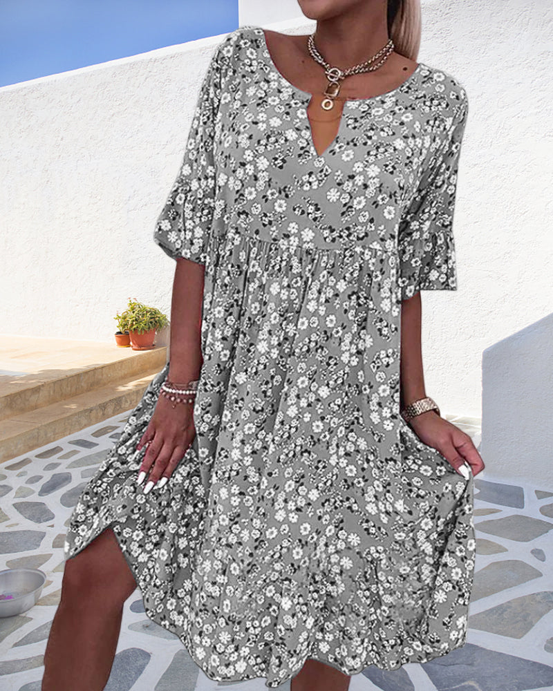 Modna haljina s V-izrezom s cvjetnim uzorkom 2023
